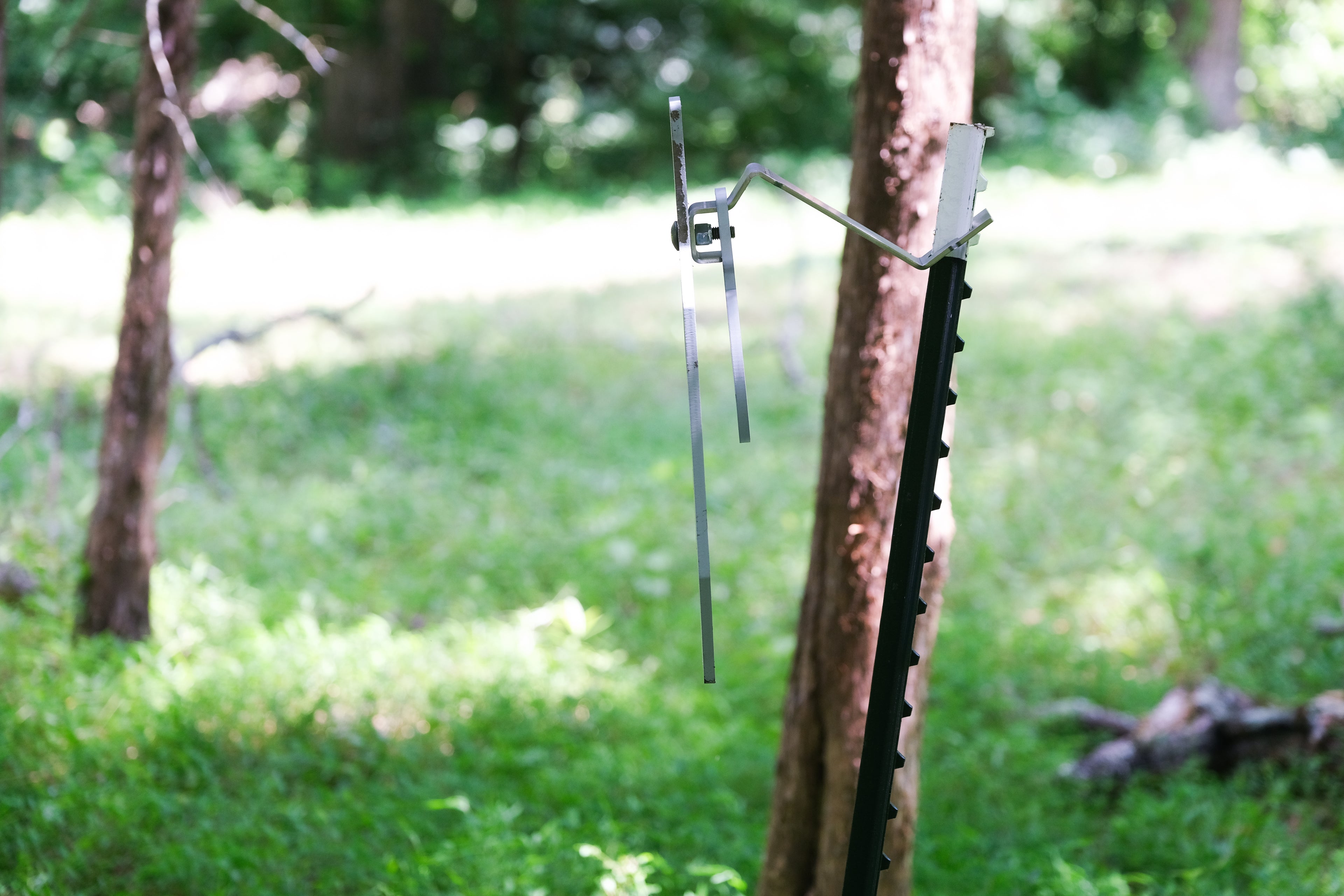 20" Single Hole Dynamic Bullseye Torso Target with Dynamic T-Post Hanger.